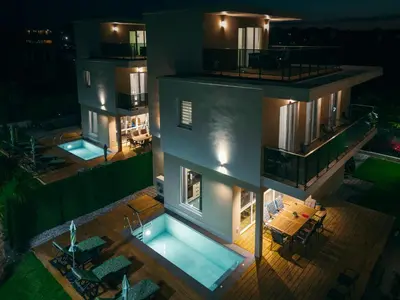 an aerial view of a house with a swimming pool at Paradise villas in Sozopol