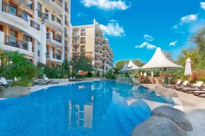 a swimming pool in the middle of a building at HARMONY SUITES Grand Resort PREMIUM Ferienwohnung in Sunny Beach