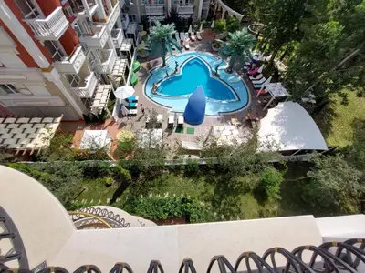 an overhead view of a swimming pool at a hotel at HARMONY SUITES Grand Resort PREMIUM Ferienwohnung in Sunny Beach