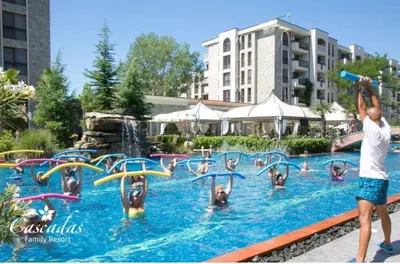 a group of people playing in a water park at Cascadas pool view luxury apartment Sunny beach in Sunny Beach