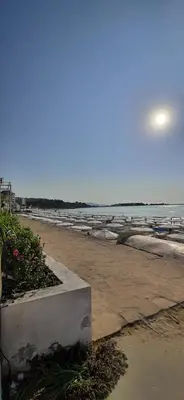 a view of a beach with the ocean in the background at Sea Apartament Kristal Beach,Nessebar in Nesebar