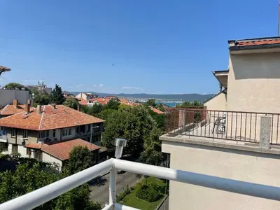 a view of a city from a balcony of a building at KudevApartment1 in Nesebar