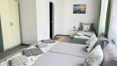 a bedroom with two beds in a room at Guest House Dani in Pomorie