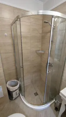 a shower stall with a toilet in a bathroom at Luxuriöse Ferienwohnung im Harmony Suites Monte Carlo in Sunny Beach
