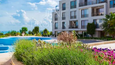 a view of a building and a swimming pool at June Sea view Studio Apartment in Burgas City