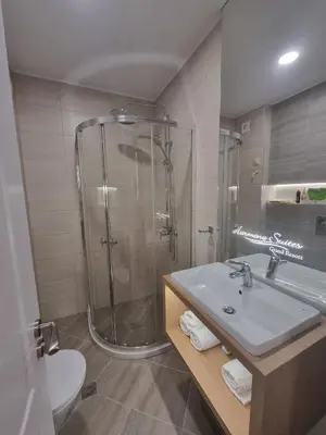 a bathroom with a shower and a sink at Harmony Suites 16 in Sunny Beach