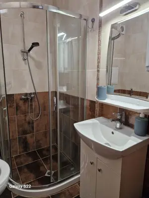 a bathroom with a shower and a sink at De Ja Vu- Zdravez in Burgas City