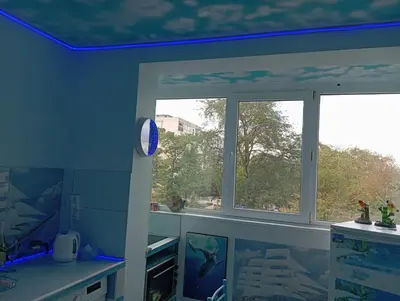 a room with two windows and a blue ceiling at Apartament ALBATROS in Burgas City