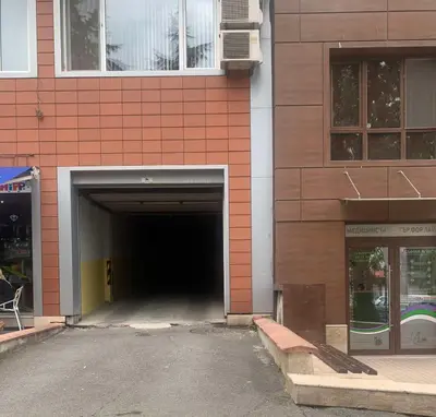 a tunnel in the side of a building at Asinela Home с гараж in Burgas City