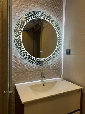 a bathroom with a sink and a mirror at Sorrento Sole Mare Studio Appartment in Sveti Vlas