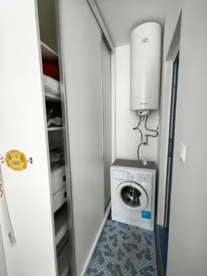 a laundry room with a washer and dryer at Blu Bey Pomorie in Pomorie