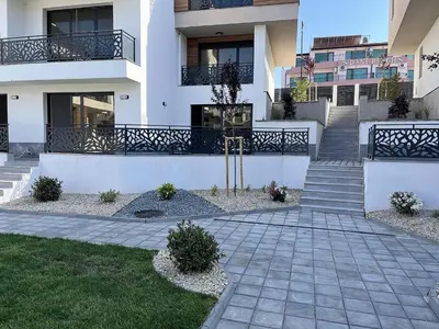 a white building with stairs and a walkway at Студио Морски дни-топ локация в Созопол in Sozopol