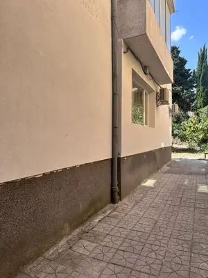 a pipe on the side of a building at Romantic City Central Apartment in Varna City