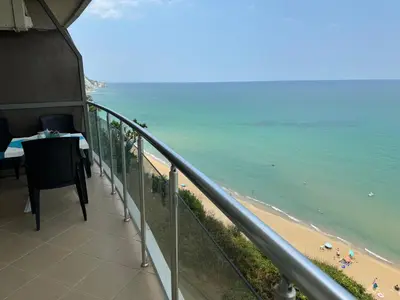 a balcony with a view of the beach at Stunning seaview - 50m to the beach in Byala