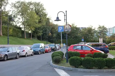 a bunch of cars parked on the side of a street at Burgas Residence 504 l Indoor Parking l Breakfast & SPA available in Burgas City