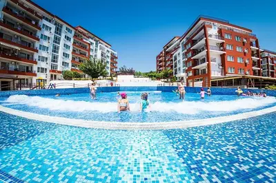 a group of people playing in a swimming pool at Roof top sea view apartment 167,2ložnice,4-7 osob in Sveti Vlas