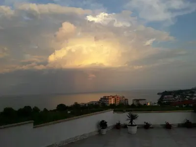 a view of the ocean with a rainbow in the sky at Villa Byala Grape House in Byala