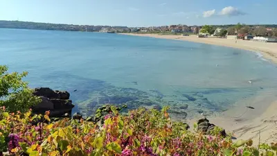 a view of a beach and the water at Апартаменты Мисаря in Sozopol