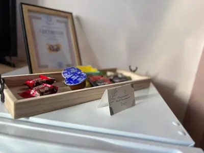 a tray of chocolates sitting on top of a table at GRAND STUDIO SEA GARDEN - top center in Burgas City