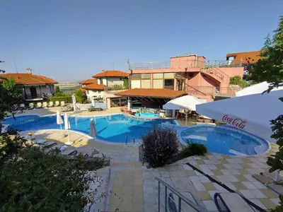 a view of a swimming pool in a resort at Bay View Villas apartment NONA 1C - Kosharitsa in Kosharitsa