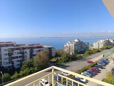 a view of a city and the ocean from a balcony at Aria private apartments in Fort Noks Grand Resort - Saint Vlas in Elenite
