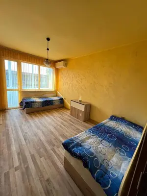 a bedroom with two beds in a room at Varna Top Central Apartment-Tulip in Varna City