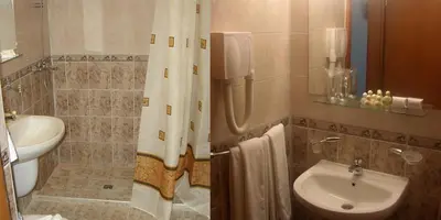 a bathroom with a sink and a toilet at SeaInn in Obzor