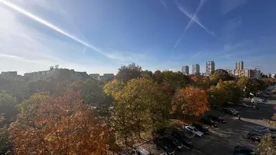 an aerial view of a parking lot in a city at Prestige Apartment 1 in Burgas City