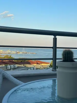 a view of the ocean from a swimming pool at Family Hotel Berlin Beach Sveti Vlas in Sveti Vlas