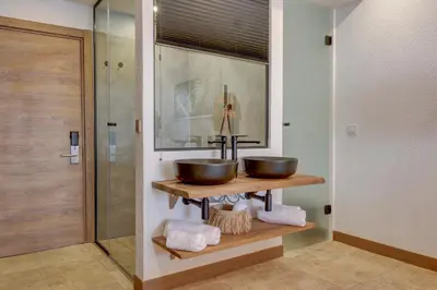 a bathroom with a sink and a shower at La Boheme - Adults Only in Obzor
