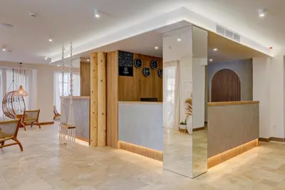 a lobby with a glass wall in a room at La Boheme - Adults Only in Obzor