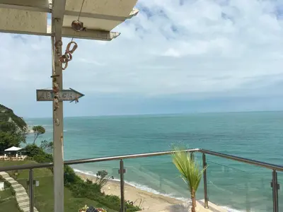 a view of the ocean from the balcony of a resort at HPManagement Byala Beach Residence Apartments in Byala