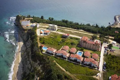 an aerial view of a resort near the ocean at Вили Vemara club in Byala