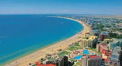 an aerial view of a beach and the ocean at 2 kamer appartement Nessebar Fort Club Sunny Beach in Sunny Beach