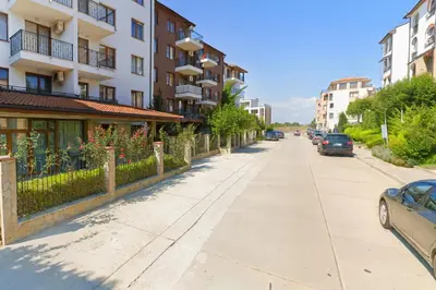 an empty street in a city with buildings at Poseidon Nessebar Private Apartment in Nesebar