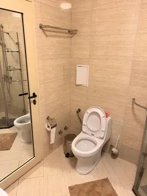 a bathroom with a toilet and a sink and a shower at Sea Home in Sunny Beach