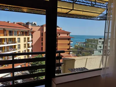 a view of the ocean from a balcony at South Beach Apartment in Nesebar