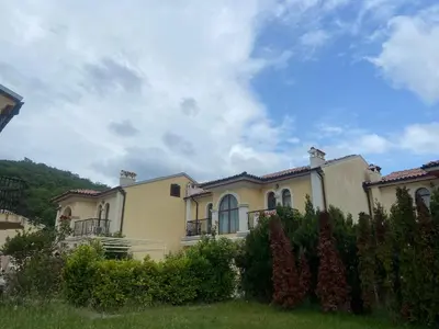 a large yellow house with a sky at Private Villa in Elenite Resort in Atanasovo
