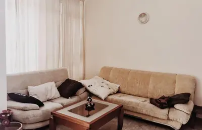 a living room with a couch and a coffee table at Spacious Modern Two-Bedroon Suite in Elit 1 Complex in Sunny Beach