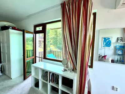 a room with a desk and a window at Arkutino Beach in Burgas City