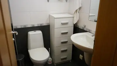 a small bathroom with a toilet and a sink at Apartmány Bulharsko Sveti Vlas - Garden of Eden in Sveti Vlas