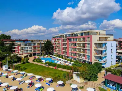 an aerial view of a resort with a pool and umbrellas at Aurelia Beach Complex in Ravda