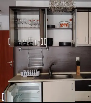a kitchen with a sink and a counter top at Studio w kompleksie Ethara-3 in Sveti Vlas