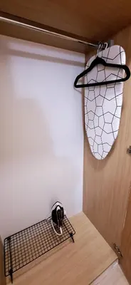 a keyboard sitting on a shelf next to a door at Studio M in Sveti Vlas