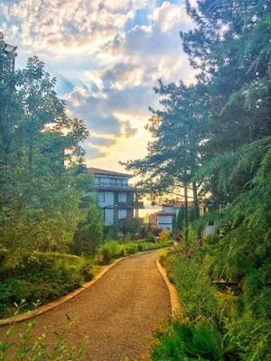 a dirt road with a building in the background at Studio Sea Breeze Veranda in Santa Marina in Sozopol
