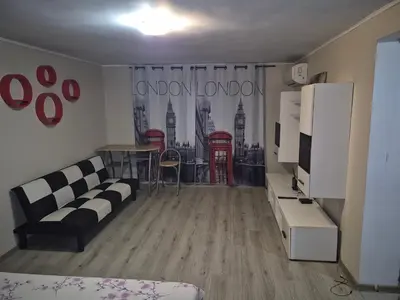 a living room with a couch and a table at Luxury Apartments Central KIRIL I METODII 3 in Burgas City