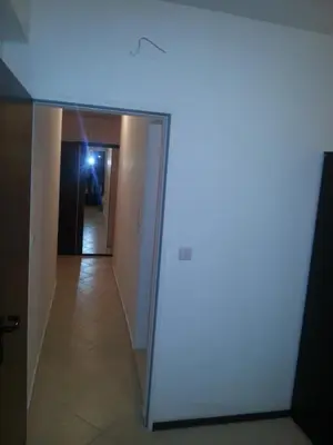 a room with a glass door and a hallway at Apartment Nova in Burgas City