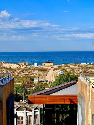 a view of the ocean from a building at Vila Victoria Primorsko in Primorsko