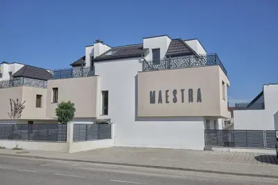 a white building with a sign for a museum at MAESTRA Bamboo Beach Luxury Apartment - FREE Parking in Sozopol