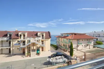 a view of a apartment complex with a marina at MAESTRA Bamboo Beach Luxury Apartment - FREE Parking in Sozopol